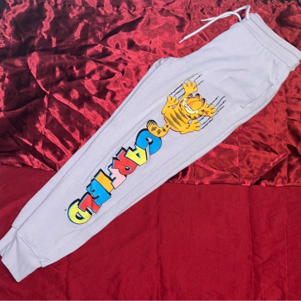 2 pairs of Character sweatpants